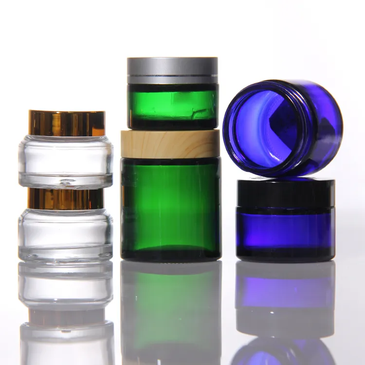 ホット販売高級透明クリームガラス製品化粧品包装アイフェイスクリームガラス瓶カバー付き